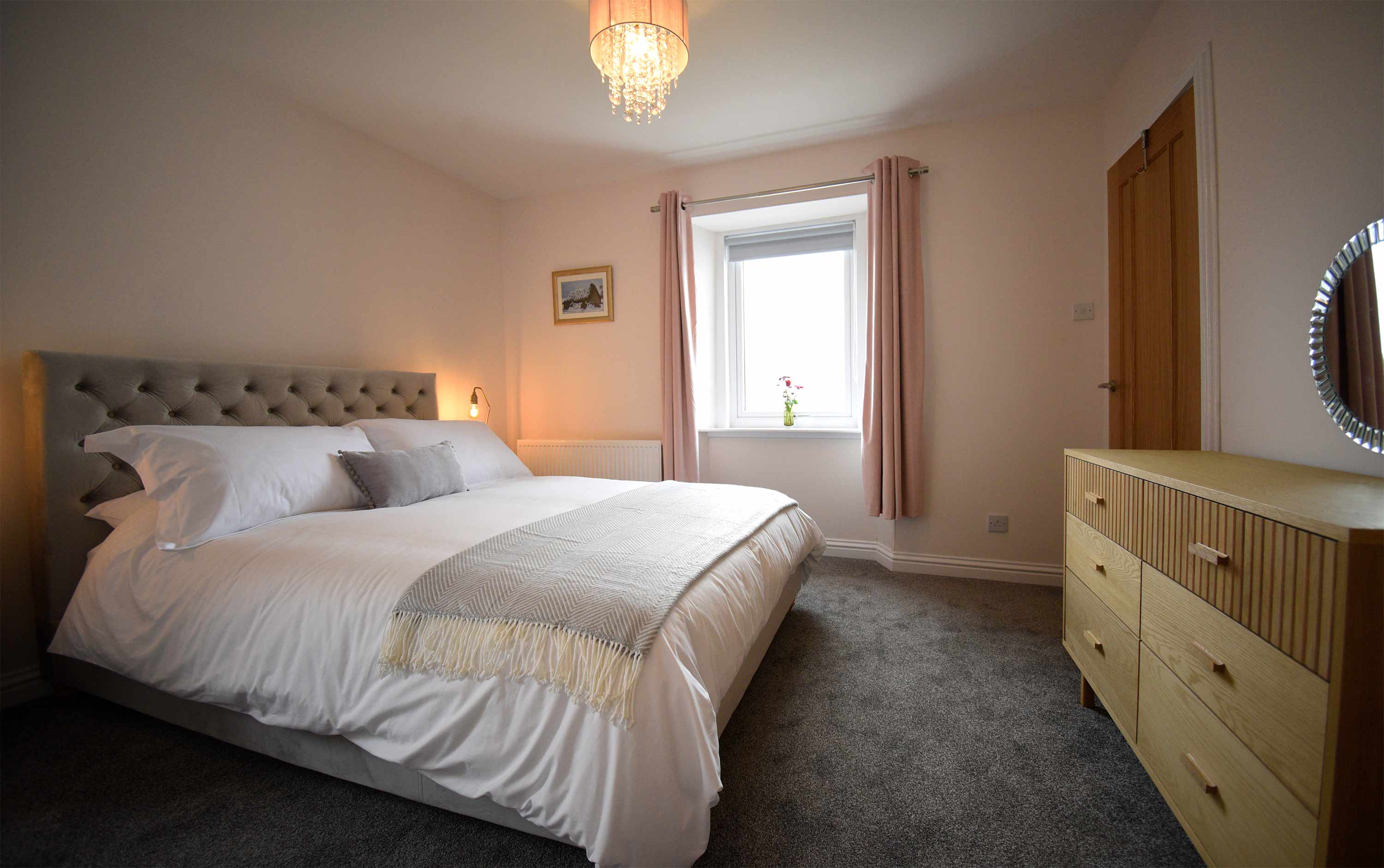 King Size Double Bed in our Self Catering Accommodation near Dunvegan with Sea Views En Suite Bathroom and WIFI Internet Access