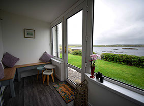 Enjoy stunning sea views from Tigh Beag na Mara Porch
